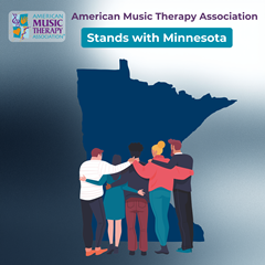 Graphic with the American Music Therapy Association logo and the words �€œAmerican Music Therapy Association�€� and �€œSta nds with Minnesota�€� above a dark blue silhouette of Minnesota; five adults stand arm-in-arm in front of the state on a soft blue gradient background.