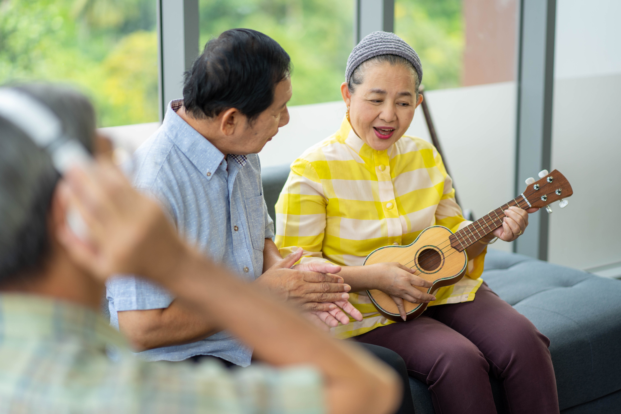 group of senior Asian people enjoy meeting during Christmas and new year festival celebration party.