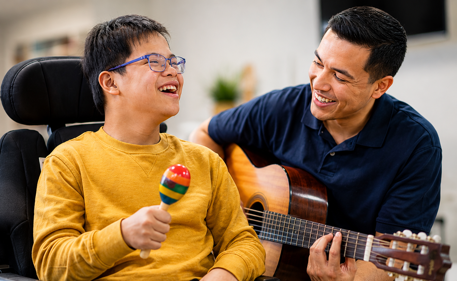 amta-music-therapy-wheelchair-guitar-session