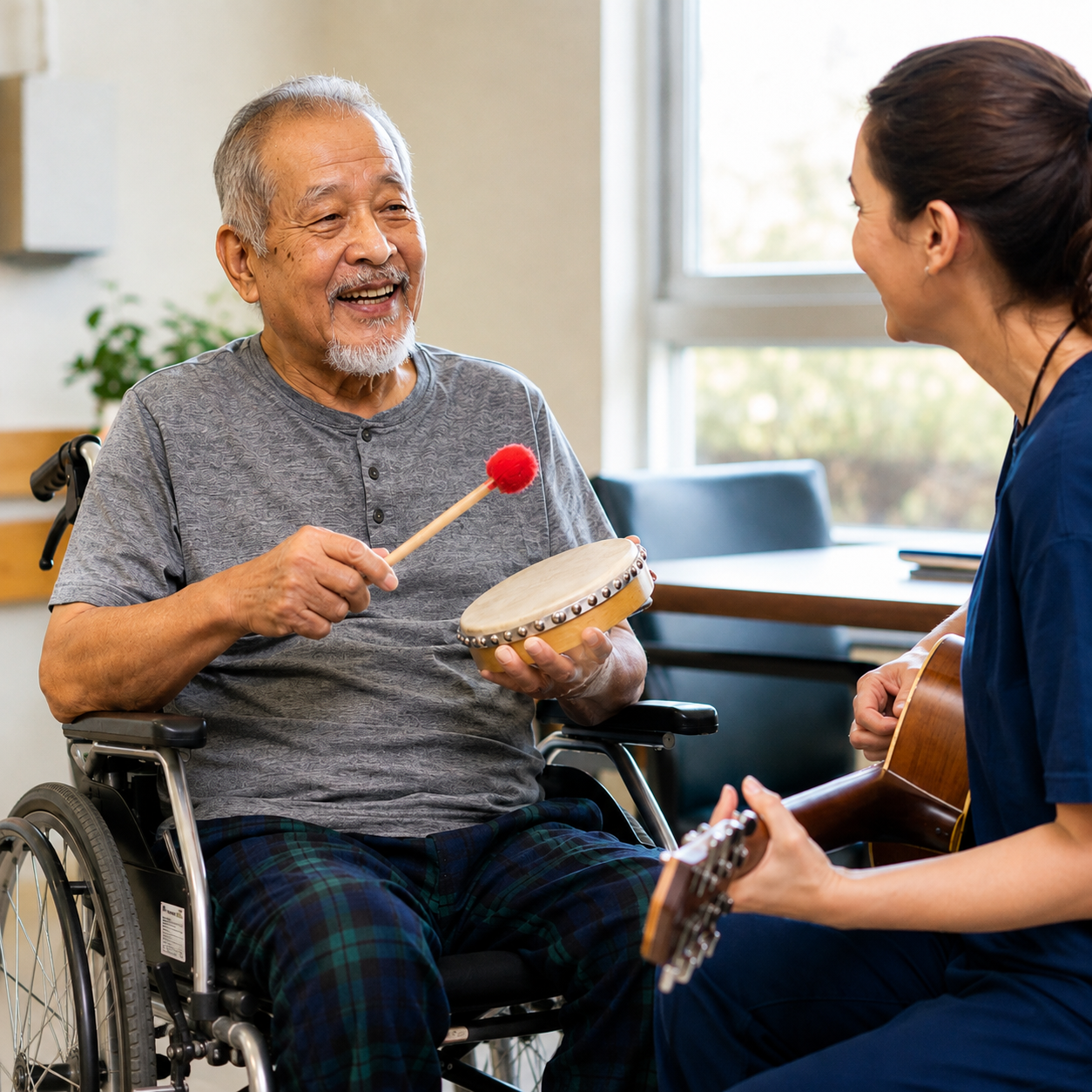 music-therapy-elderly-man-wheelchair-tambourine-session