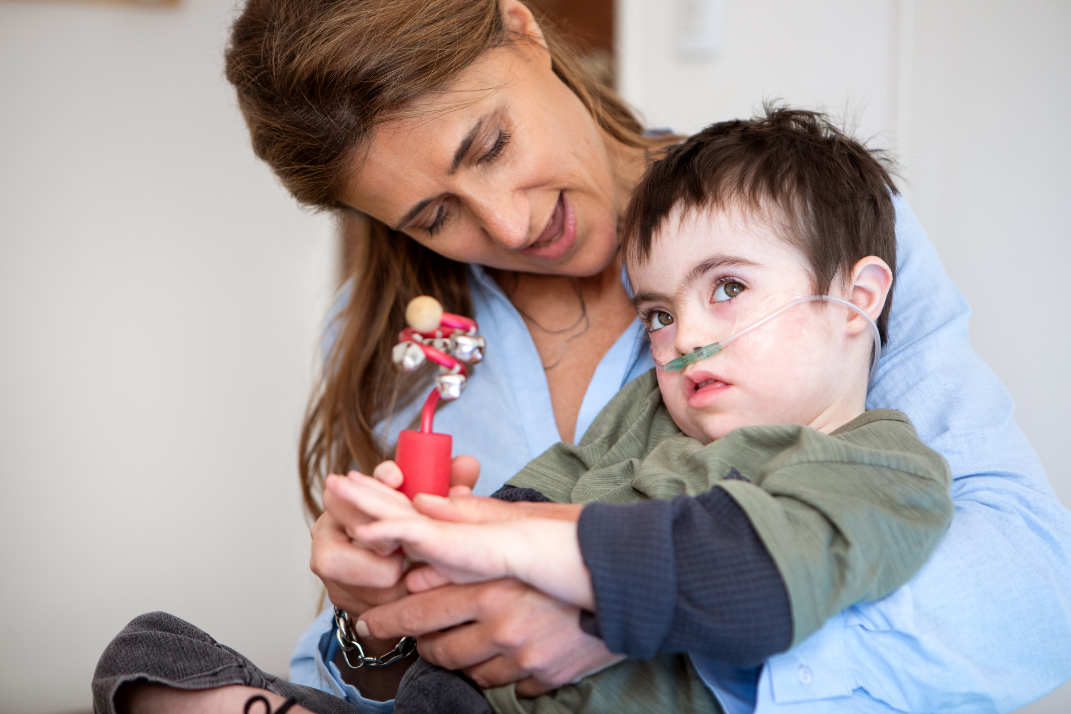 Professional special education music therapy session in a bright, welcoming classroom 678241
