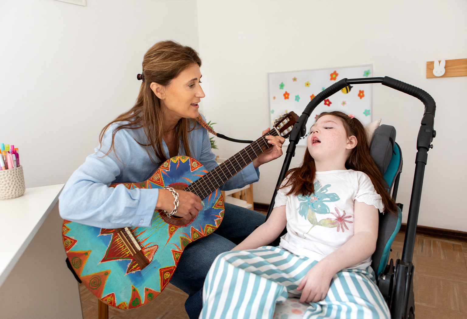 music-therapy-child-wheelchair-guitar-xylophone